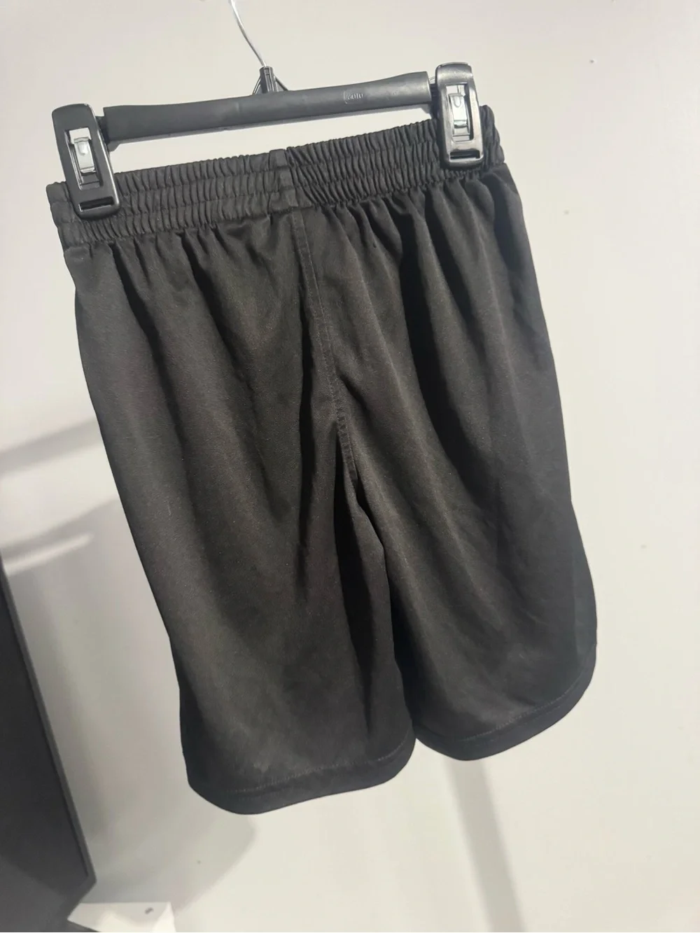 Puma Black Shorts with White Label and Green Logo